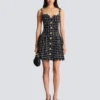 Tweed dress with chain straps