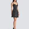 Tweed dress with chain straps