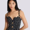 Tweed dress with chain straps