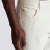White denim straight-cut jeans